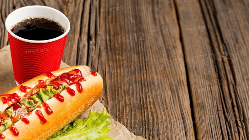 Hot dog with soda copy space