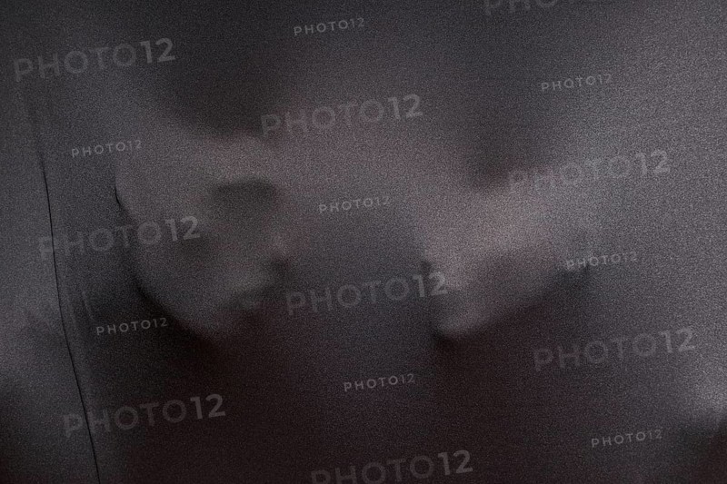 Imprints human faces gray cloth