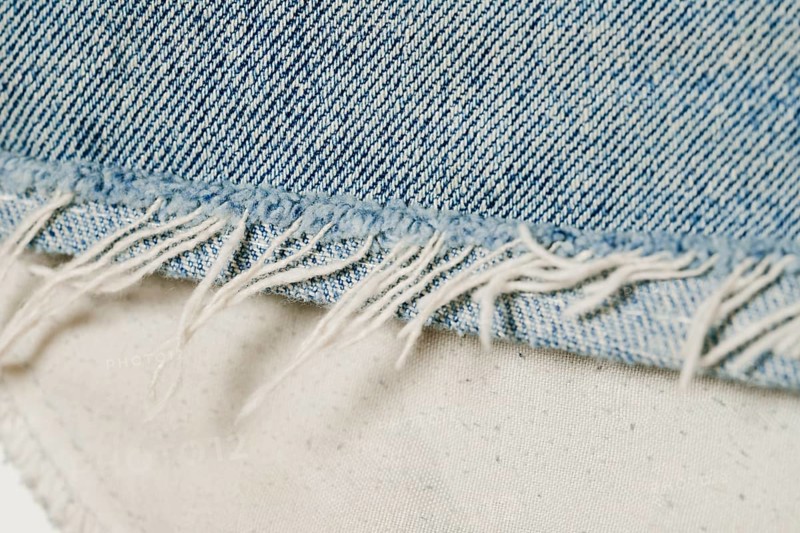 Light blue jeans close up