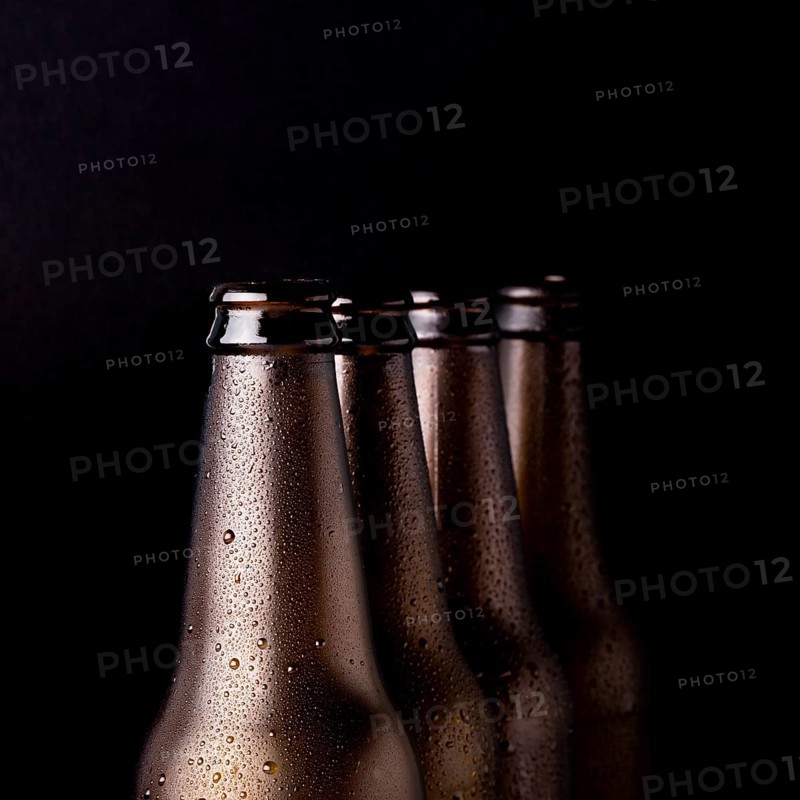 Line black beer bottles