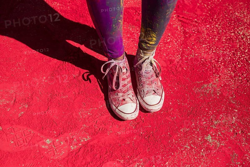 Low section woman s shoes with holi color powder
