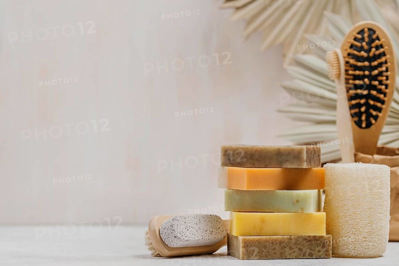 Natural wooden brushes soaps copy space background
