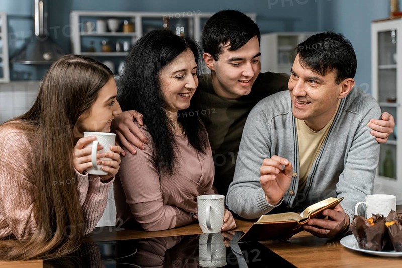 People reading from bible kitchen