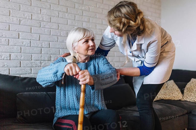 Retirement home concept with nurse woman