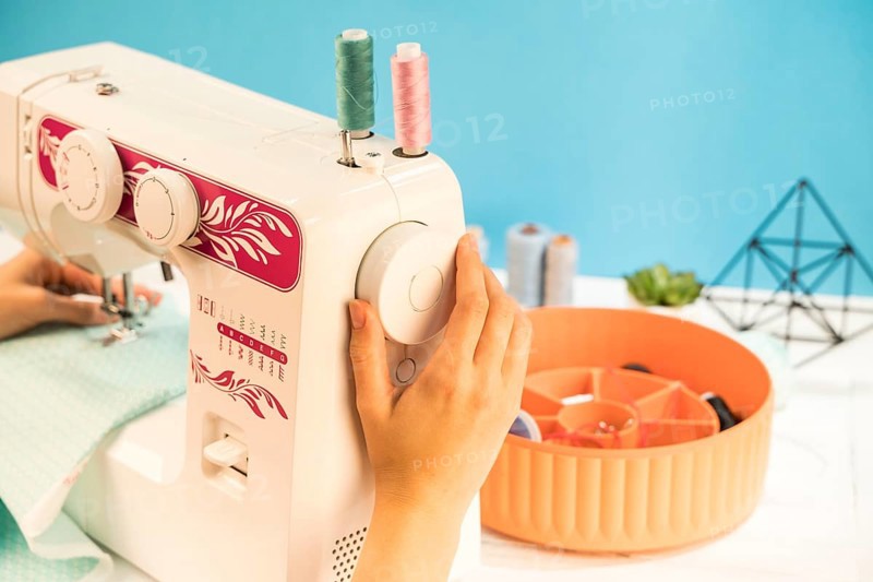 Sewing machine with blue background
