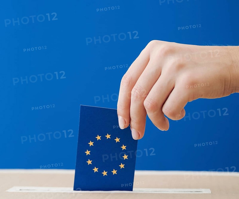 Side view woman being involved european election close up
