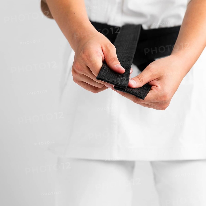 Woman getting dressed uniform close up