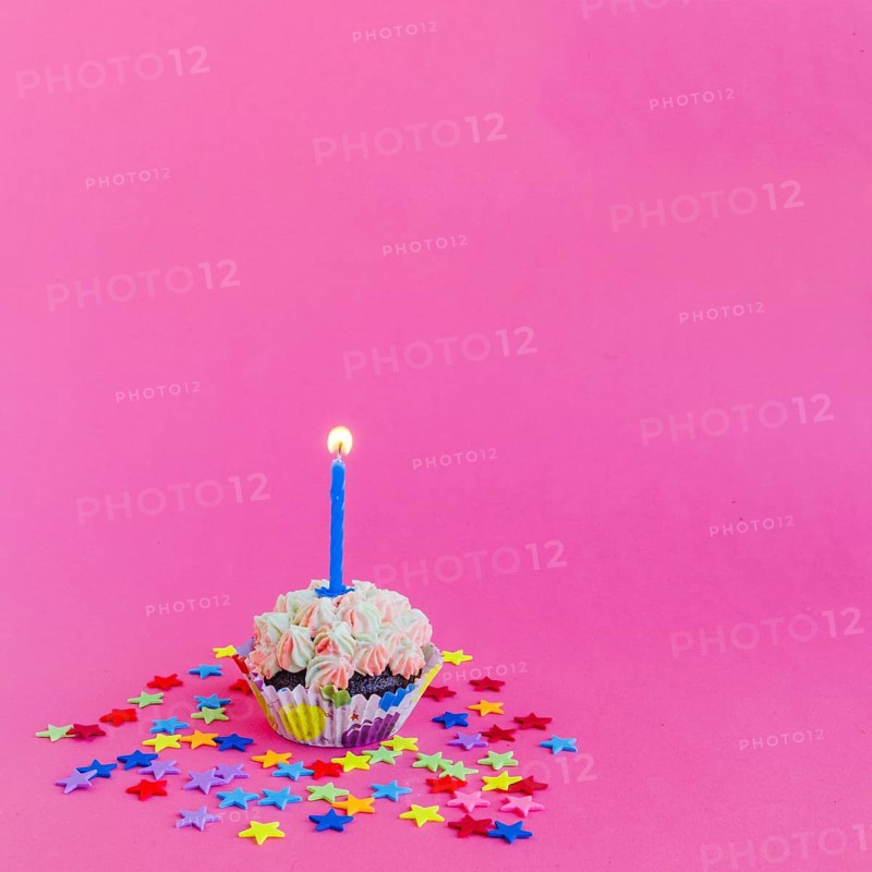 Candle burning cupcake