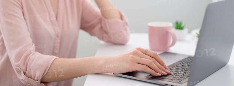 Close up woman desk working