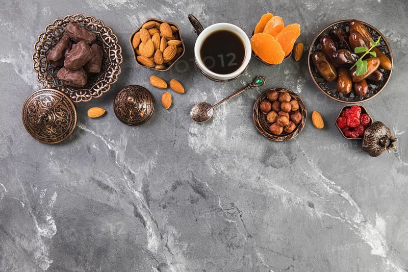 Coffee cup with dates fruit nuts