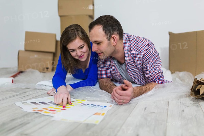 Couple choosing color interior decoration