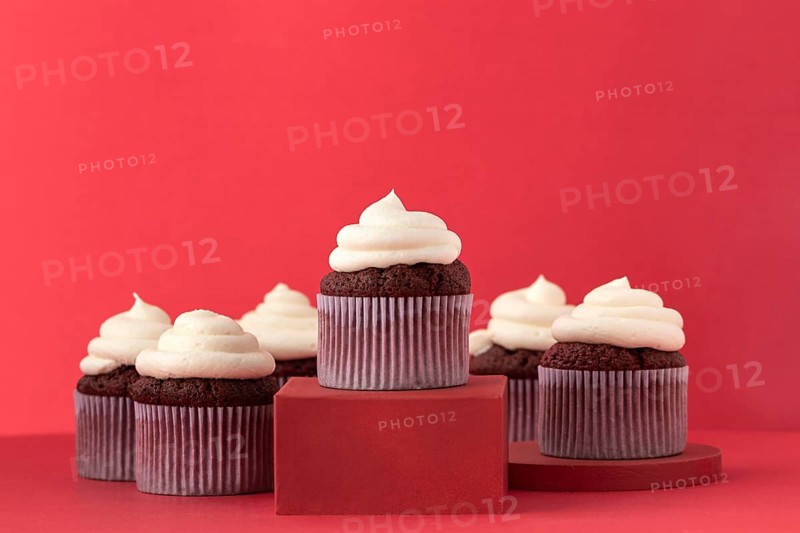 Delicious cupcakes with cream assortment