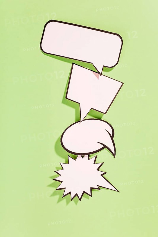 Different type white retro speech bubbles green background