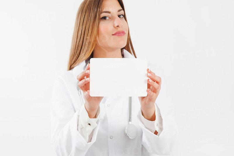 Female doctor showing paper