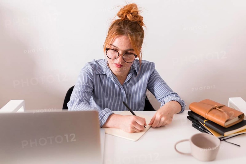 Front view female teacher home during online class