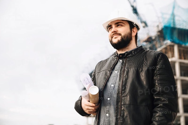 Handsome draftsman construction site