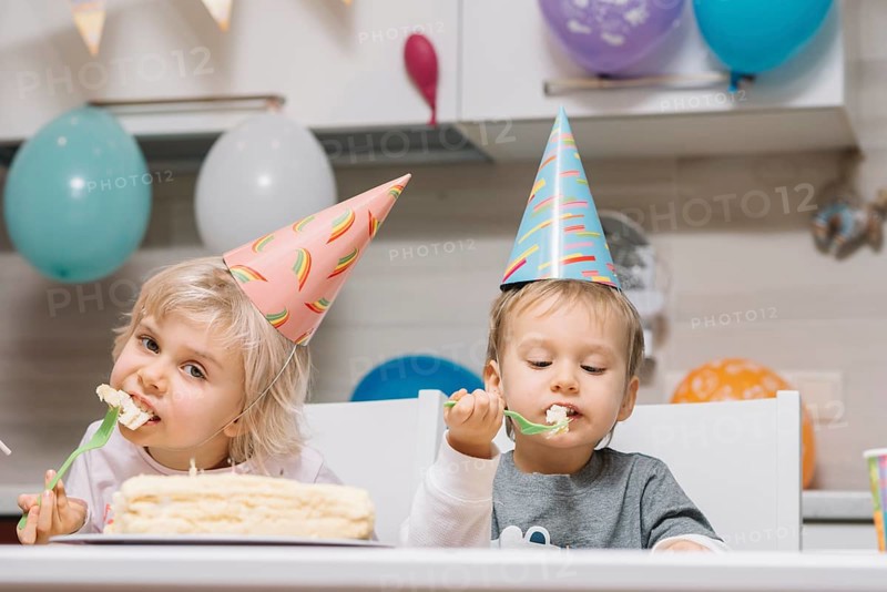Kids eating cake birthday party