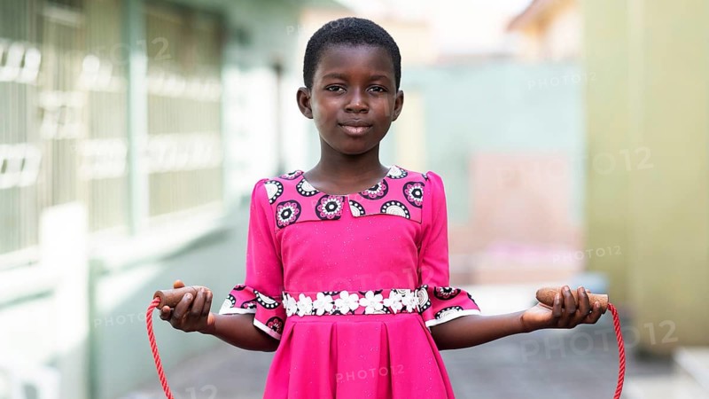 Medium shot kid holding jumping rope