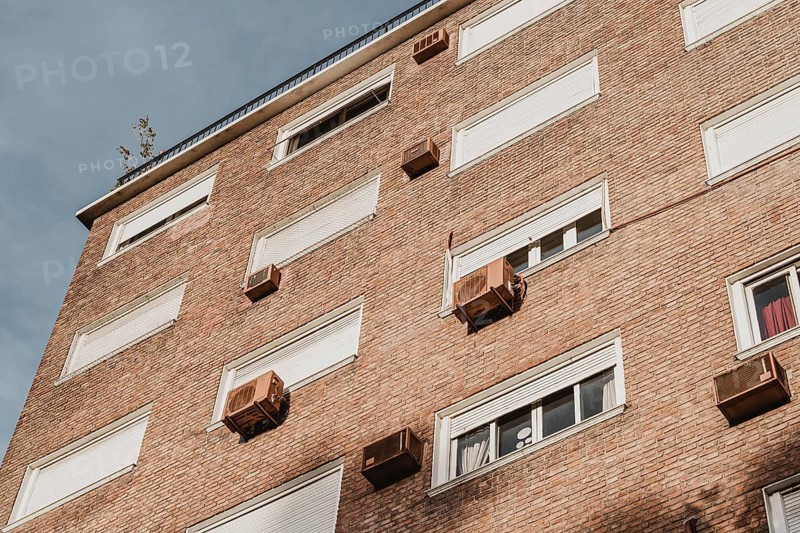 Residential building city with air conditioning units