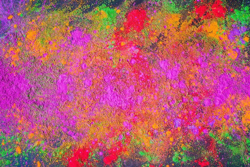 Scattered purple powder dark table