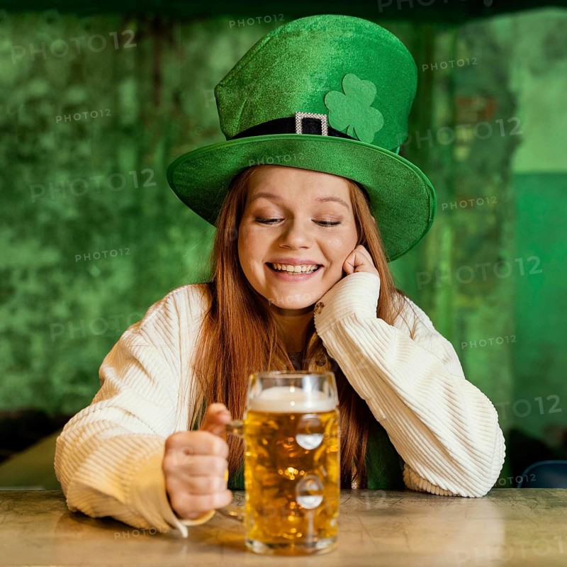 Smiley woman celebrating st patrick s day bar