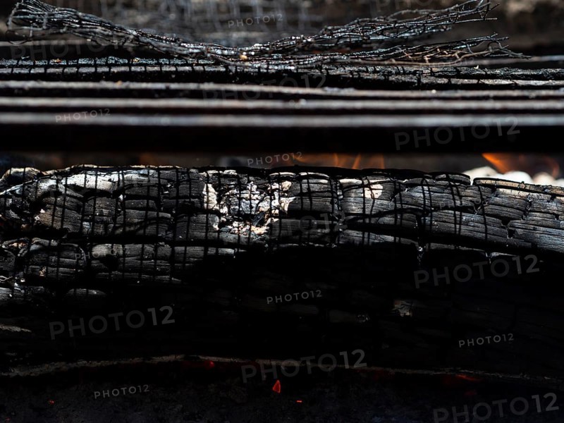 Smoldering ashes bonfire