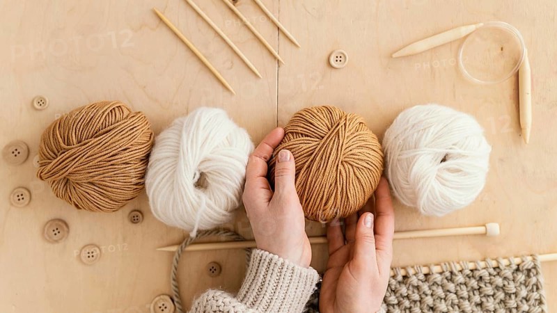 Top view assortment with knitting tools
