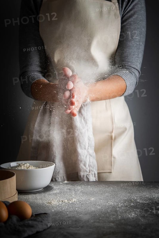 Vertical shot woman with flour palms