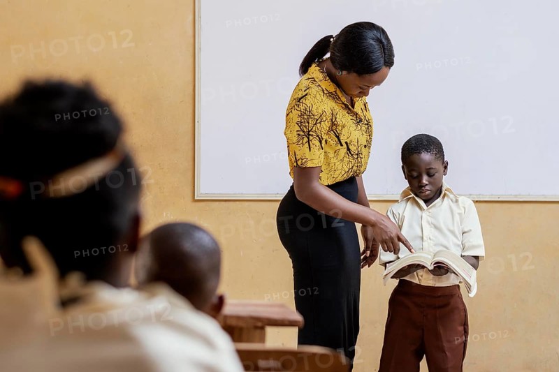 African kids having lesson school
