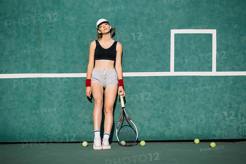 Athletic woman sportswear tennis court