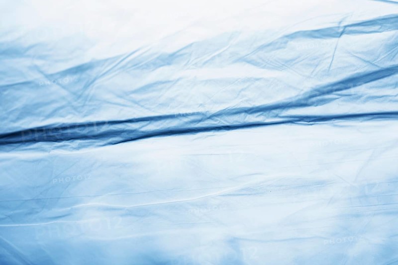 Blue plastic bag texture close up