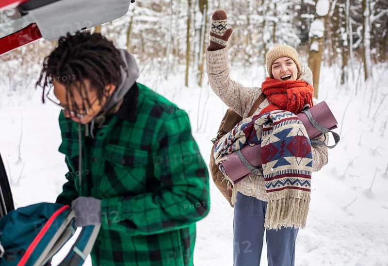 Couple winter time with backpacks