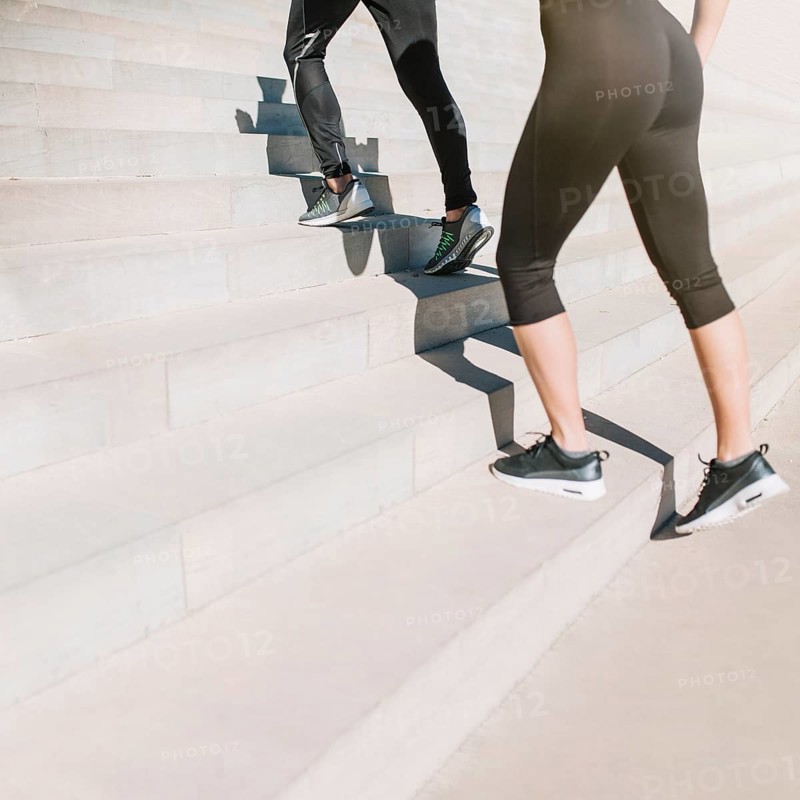 Fit girls walking up stairs