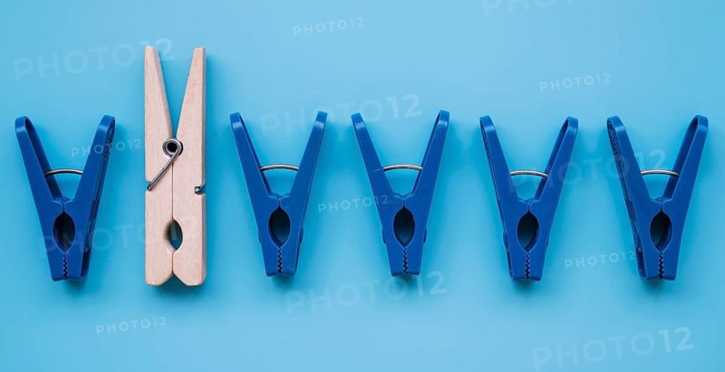 Flat lay plastic clothespins wooden one