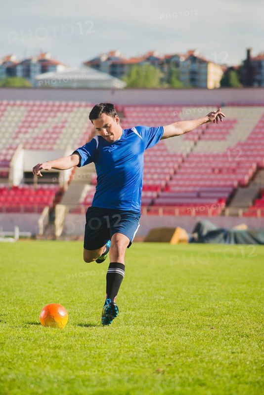 Football player shooting kick