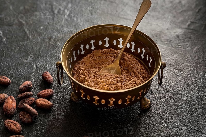 High angle bowl with cocoa powder cocoa beans