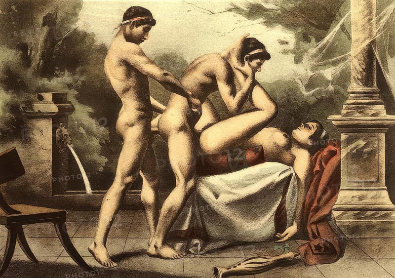 Two men and a woman having sex