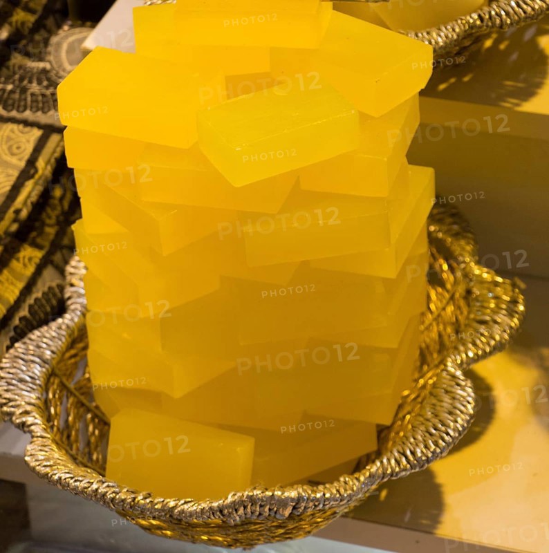 Collection of bars of fragrant hand made organic soap in a basket