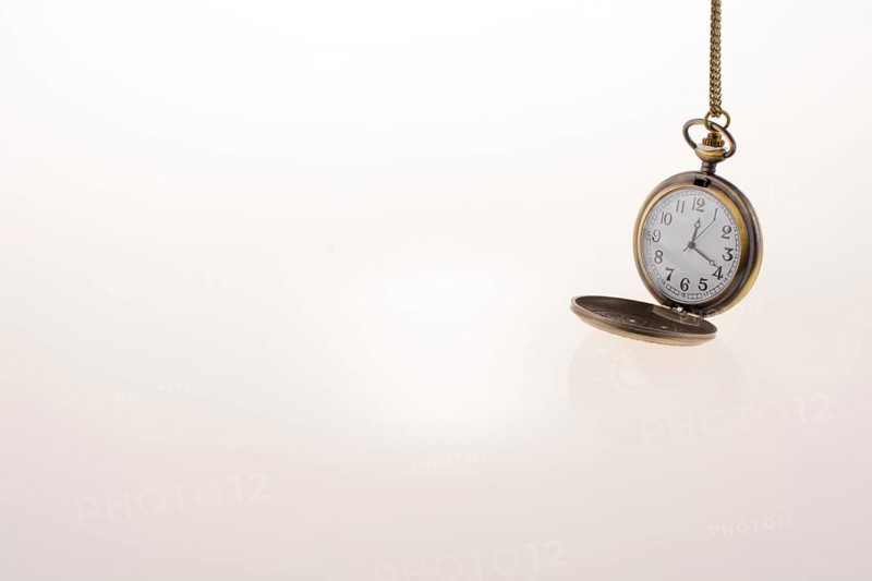 Isolated retro styled pocket watch on white background