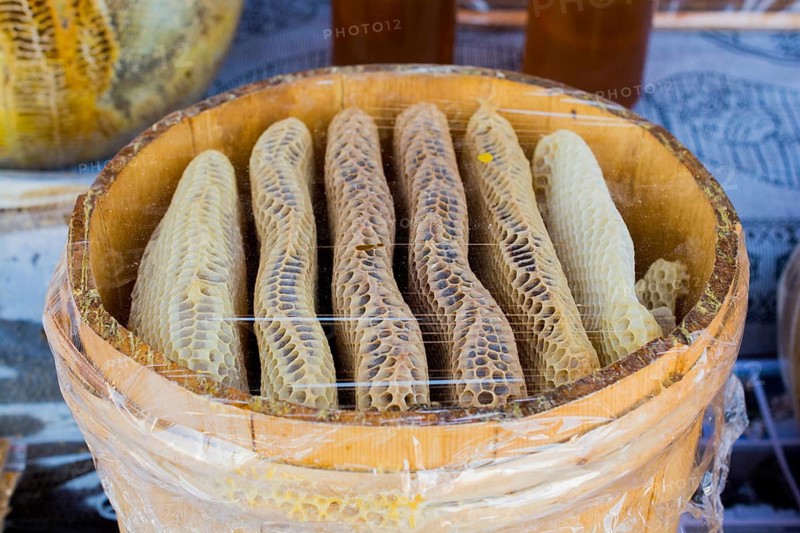 Sweet fresh honey in the sealed comb frame