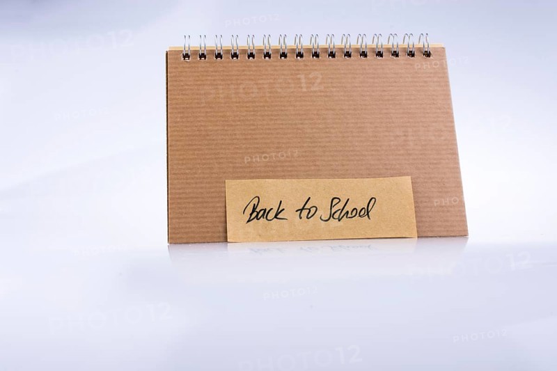 Notebook and back to school title on a notebook