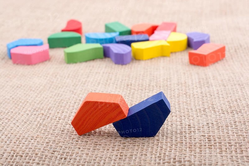 Colorful wooden pieces of a logic puzzle