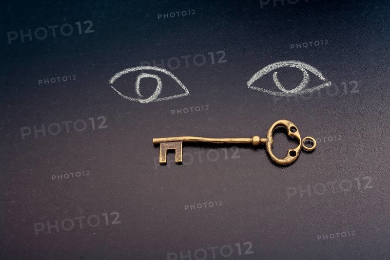 Retro styled golden color key forms the word key
