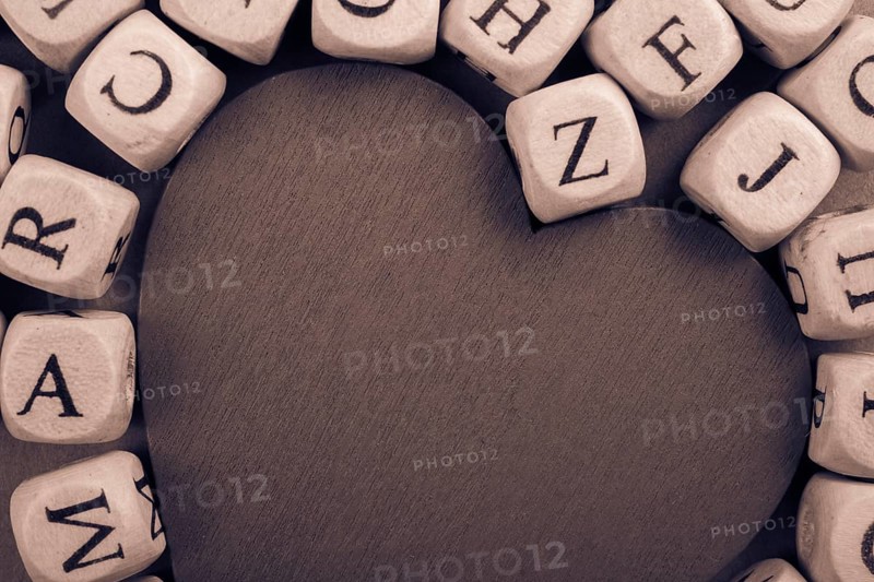 Red Love icon and Letter cubes of made of wood