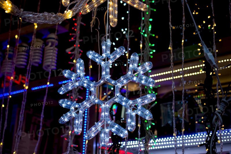 Christmas and party lights in the shape of a snowflake