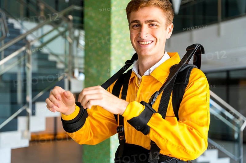 Portrait of an employee with an exoskeleton from a futuristic high-tech warehouse