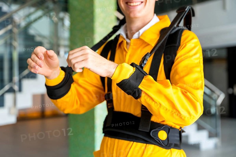 Portrait of an unrecognizable employee with an exoskeleton from a futuristic high-tech warehouse