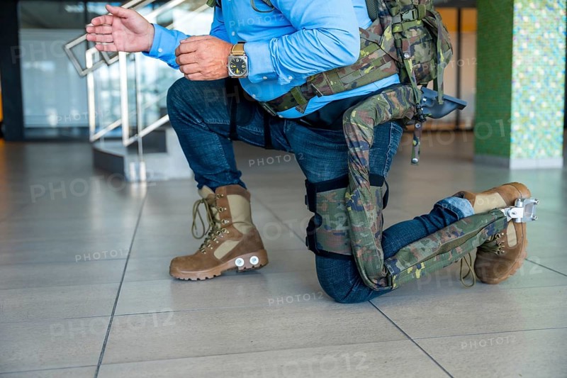 Mechanical military exoskeleton to help unrecognizable soldiers and military personnel in their work