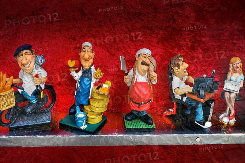 Funny ceramic figurines with different professions