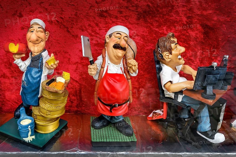 Funny ceramic figurines with different professions